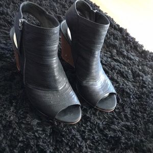 Black zip open toed boots